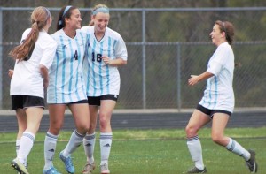 March 18, 2016 - The Lady Panthers celebrate a goal in the second half. Down 4-2, Starr’s Mill rallied to defeat Harrison 5-4, staying undefeated.