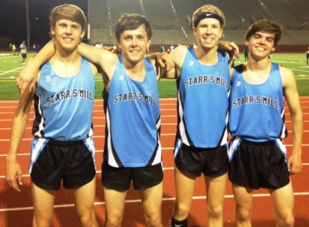 The 4x1600 boys relay team stands tall after breaking the school record for the event at the Coaches Invitational on March 18. They posted a time of 18:22.43 in their final race as a team.