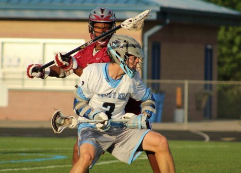 A Panther player spins past a Grady defender to move the ball upfield. The Panthers exploited the Gray Knights’ defense all night, resulting in a 16-2 victory.