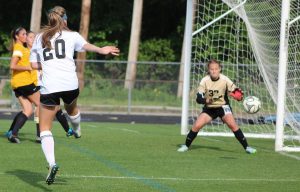 Senior Laurel Parker takes a shot on goal in the state playoff matchup against Harris County. The Lady Panthers were carried by seniors Leslie Logan and Riley Clark, who combined for seven goals in the 9-0 win. 