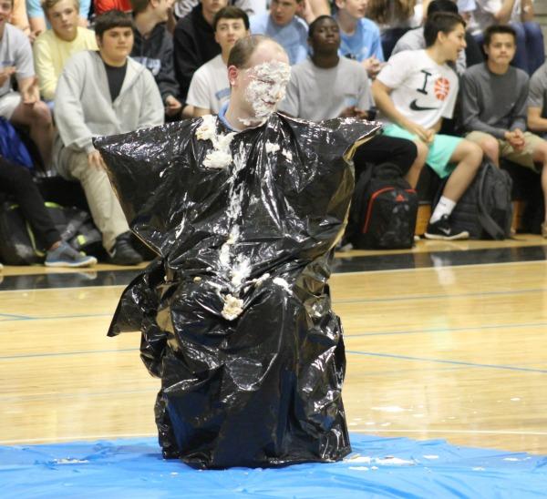 April 1, 2016- The spring sports 2016 pep rally was held in the school gym on April 1 where students of all classes sat together in the bleachers to watch and participate in an array of games and challenges. Students of all grades paid $1 to vote for a teacher they wanted to get pied in the face for the benefit of Student Government Association, and physics teacher Galin Crew won the votes.