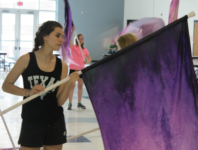 April 21, 2016- Colorguard tryouts were held in the cafeteria on April 21. The older color guard members who have been on the team for over two years helped eighth grade students from Rising Starr learn the routine for the tryouts to make next year’s team.