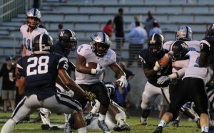 Junior Nick Brown looks for room to run against a tough Newnan defense. The Panthers were held to 11 total yards in the first quarter.