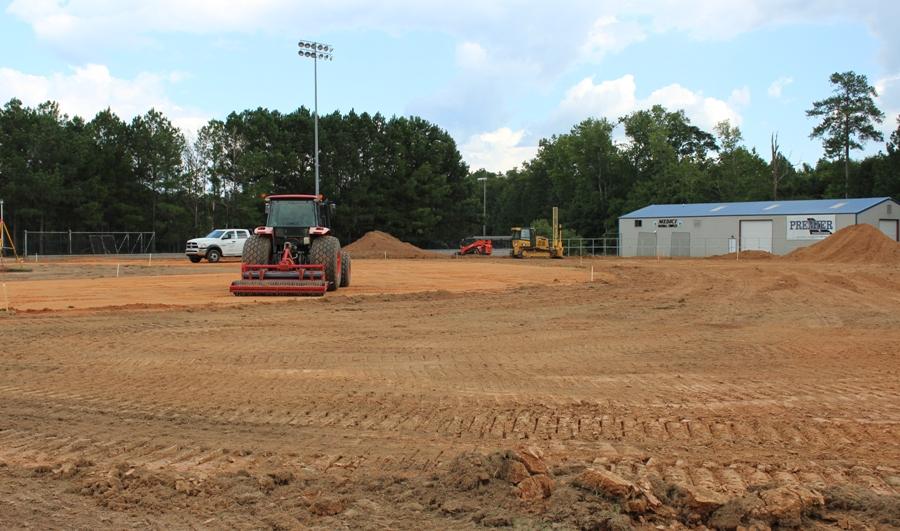 The sod has been completely ripped out and removed from the field. Reconstruction should be completed in late September.