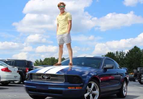 A multitude of parking spaces at the Mill are home to lavish rides like this one, most of which come as birthday presents. “I would say that, yeah, getting a car for your 16th birthday is expected around here,” Senior Abby Delbene said.