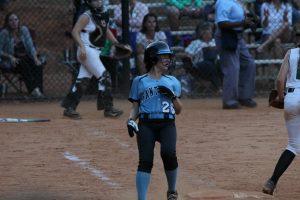 A Lady Panther runs through first base. The Lady Panthers started the game strong, quickly taking a 2-0 lead in the first inning. 