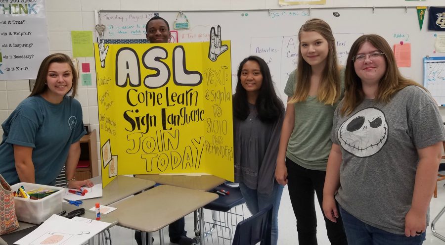 Aug. 23, 2016 - The American Sign Language club holds their first meeting to decorate a sign to advertise their club for club sign ups.  ASL will meet again at 8:10 a.m. on Sep. 7 in room 820. 