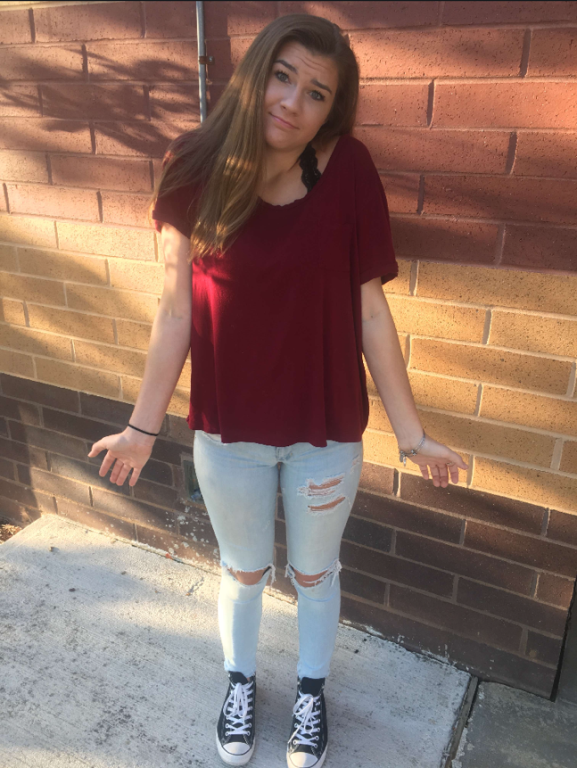 A+student+wearing+jeans+with+holes+above+the+knee+risks+receiving+a+dress+code+violation.+Her+outfit+is+in+no+way+provocative%2C+yet+she+still+avoids+administration+throughout+the+day.+