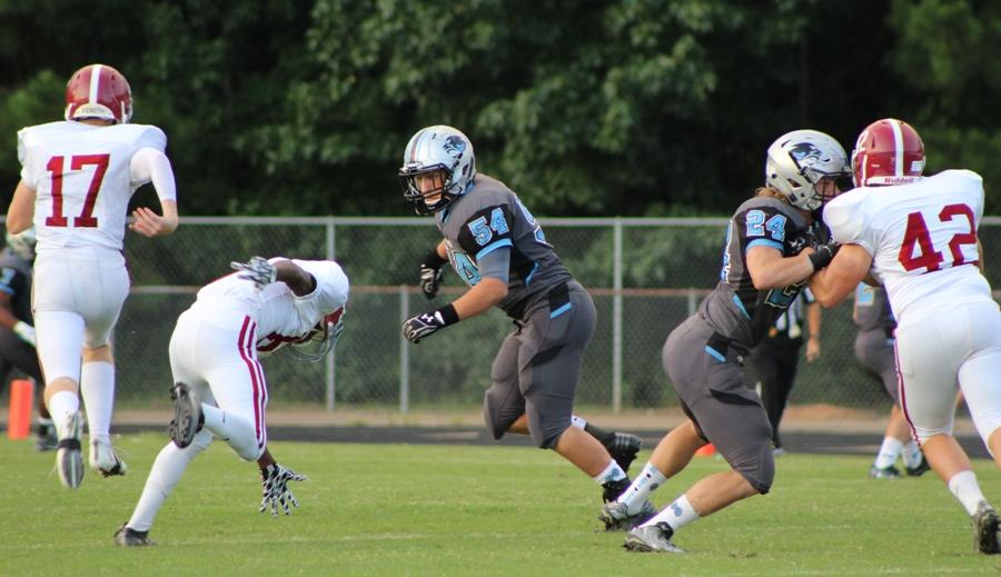 Junior linebacker Eric Donevant looks to make a block during a kickoff. Sitting with an 0-2 record, the Panthers will seek their first victory of the season against Chapel Hill this Friday at 7:30 p.m.