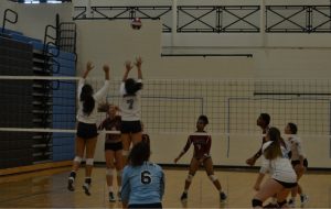 Freshman Piper Dedrick and junior Gabby Ramkissoon both jump for the ball. The Lady Panthers lost to Whitewater 2-1, but defeated Riverdale 2-0.