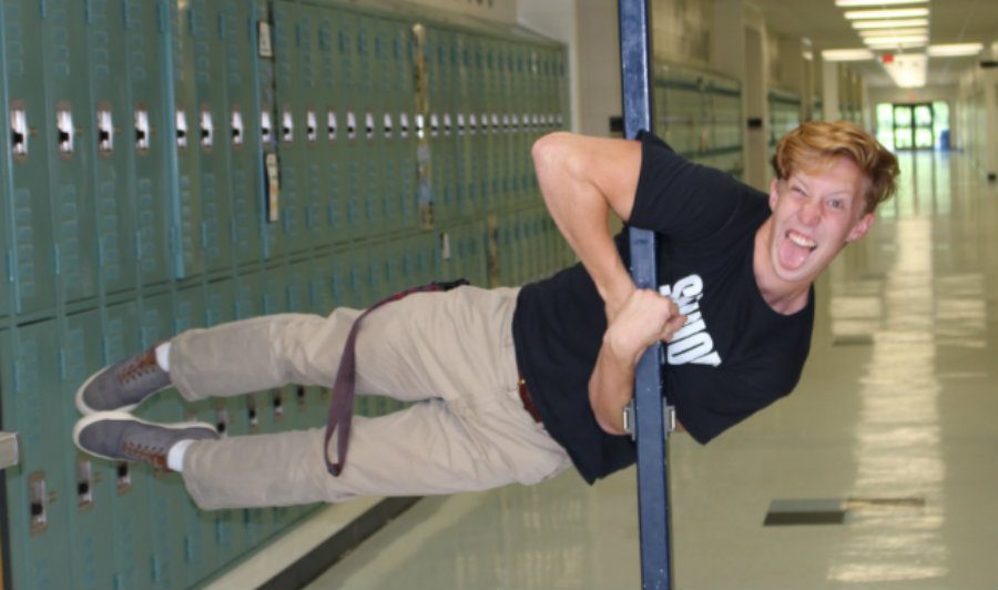 Sept. 30, 2016 - Senior member of the Panther Pride Marching Band passes through the 800 hallway on the way to his seventh period class.