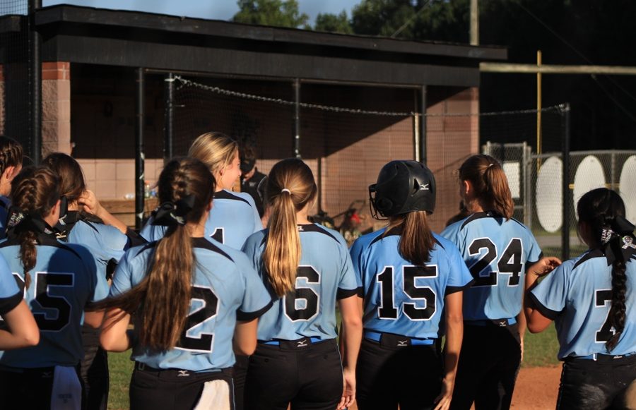 The Lady Panthers break from a huddle before the start of their game against Fayette County on Sept. 22. Starr’s Mill defeated region opponent Fayette County 17-0 in only three innings. 