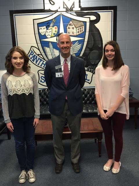 Senior+National+Merit+Scholarship+semi-finalists+Maddison+Laney+and+Aubrey+Bennett+pose+alongside+Principal+Allen+Leonard.