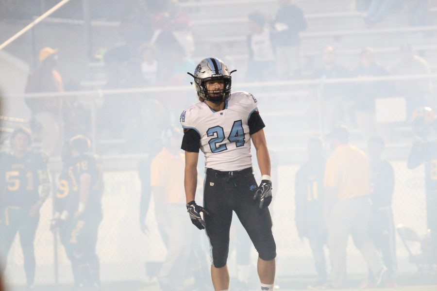 Junior defensive end Coltin Houser lines up for the opening kickoff against the Bears. The game featured two offenses that combined for over 1,000 total yards.
