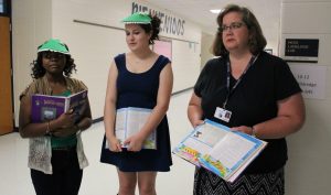 Spanish teacher Laura Alldredge prepares some of her Spanish IV students for a skit they are performing in their class. One of the reasons teachers enjoy teaching as a profession is the interaction with students and being able to impact their lives in a classroom setting.