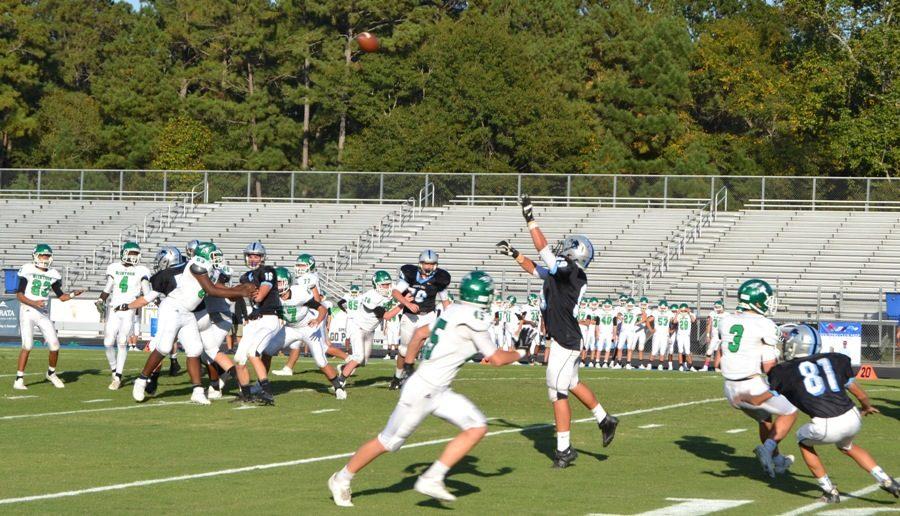 Panthers defend a McIntosh pass attempt. The Chiefs found offensive success in the air throughout the game, but they could not match the Starr’s Mill ground attack.