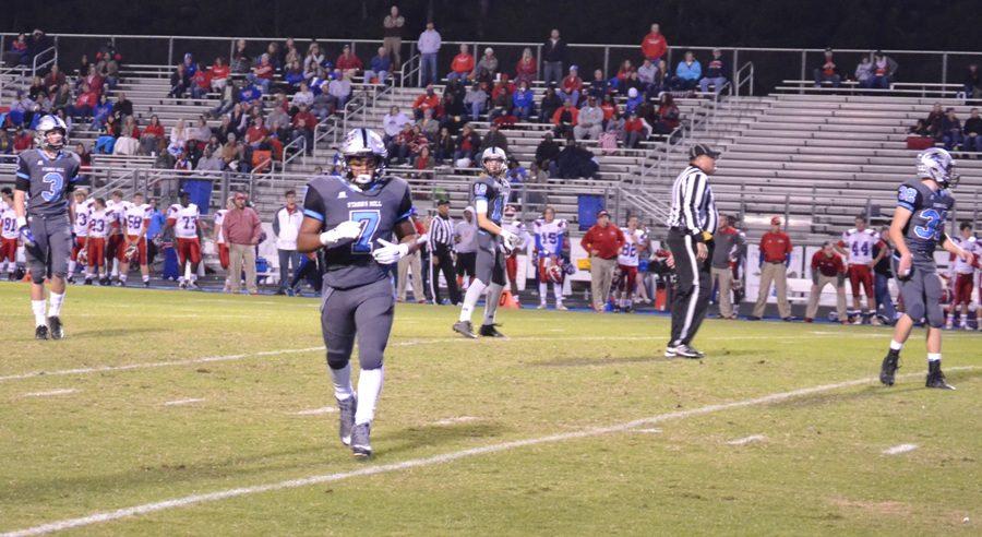 Junior Nick Brown jogs back to the sideline after a play against Veterans. With the Panthers 38-17 victory, they advance to the second round to host the 9-2 Kell Longhorns.