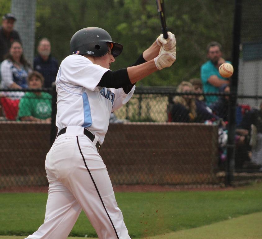 Senior Kyle Evert swings for a ball. Evert won the Wendy’s High School Heisman Award for Fayette county for his participation in baseball and basketball.