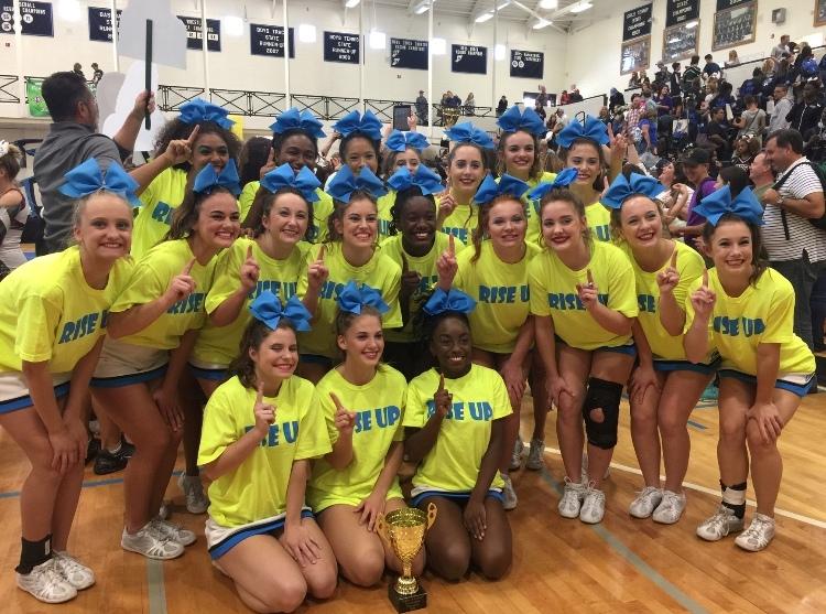 Starr%E2%80%99s+Mill+varsity+cheer+team+poses+for+a+picture+after+winning+the+region+title.+The+team+looks+to+continue+their+success+at+state+this+weekend.