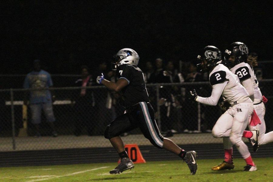 Junior Nick Brown leaves behind the Raider defense on the way to one of his touchdowns against Riverdale. Brown led the way with 200 yards for the Panthers and they look to carry that run game into their last regular season game against Fayette County on Nov. 4 at 7:30 p.m.