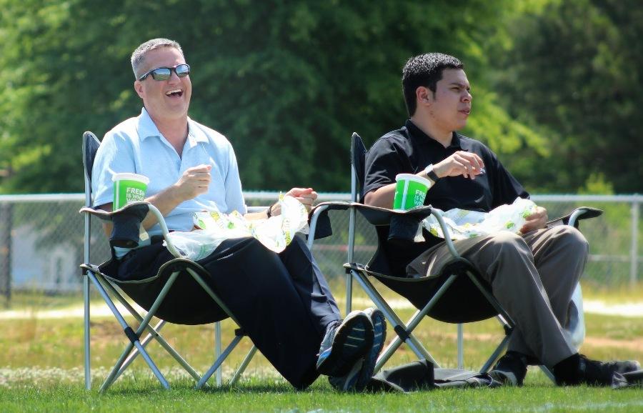 Band director Scott King (left) goes down to the middle school once a day to work with the younger students in band.