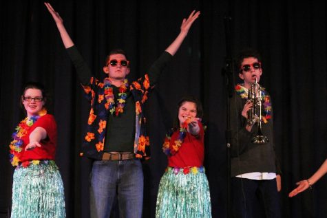 Students in adaptive curriculum specialist Courtney Savage’s class give the crowd one last pose before the show ends.  This year, the students designed a ‘spoof’ holiday concert to help show off their individual personalities and entertain the crowd.