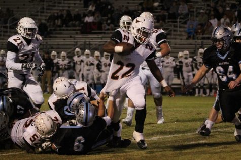 Panther defenders try to bring down a Longhorn running back. The Panthers were rarely out-rushed this season, but Kell managed to do so 318-301.