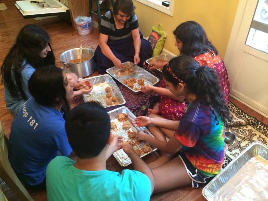 Students embrace their culture and speak in their native language while making food at home.

