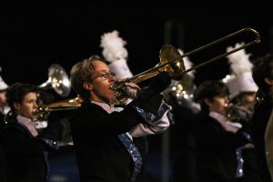 Panther pride marcher performs the trombone feature at a football game. The feature uses circus music and funny movements to present a humorous aspect in one of the show’s four movements.