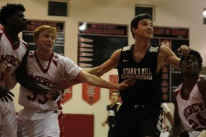 A Panther player battles for a rebound against the Bobcats. The young Panther roster looks to take Starr’s Mill to the state playoffs after falling one win shy of a postseason spot in last year’s region tournament. 