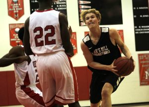 A Panther player drives toward the basket during a preseason scrimmage. “We work really well as a team so we are hoping to do really well this year,” Hudson said.