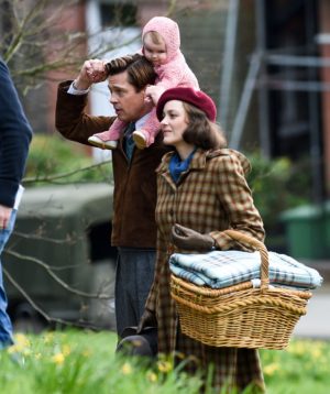 Marianne Beausejour (Marion Cotillard) and Max Vatan (Brad Pitt), with Anna on his shoulders, undergo what they intend to be their best day ever. Since there are limited peaceful moments following the events of World War II, this moment is important to the film as they enjoy a family picnic.   