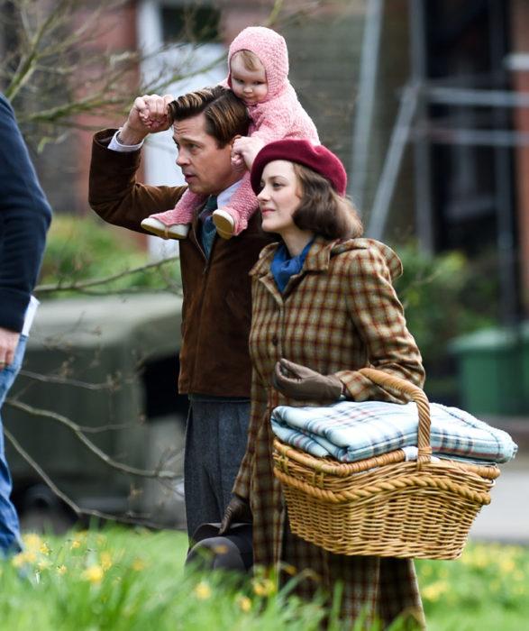 Marianne Beausejour (Marion Cotillard) and Max Vatan (Brad Pitt), with Anna on his shoulders, undergo what they intend to be their best day ever. Since there are limited peaceful moments following the events of World War II, this moment is important to the film as they enjoy a family picnic.   