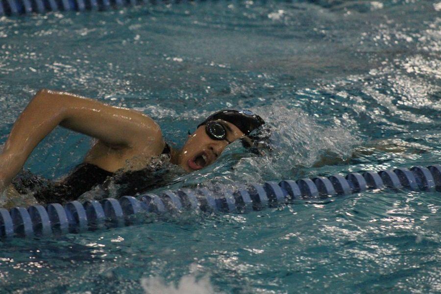 Sophomore Hayeon Choi swims freestyle at last week’s county meet. Choi was one of the 21 swimmers to qualify for the upcoming state meet this weekend at Georgia Tech.