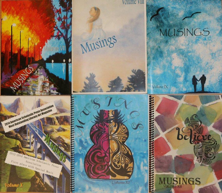 Cover art of MUSINGS magazines from past years are displayed. “Its really interesting to see the different works of literature and art that students submit,” senior and editor-in-chief of MUSINGS Walker Allen said. 
