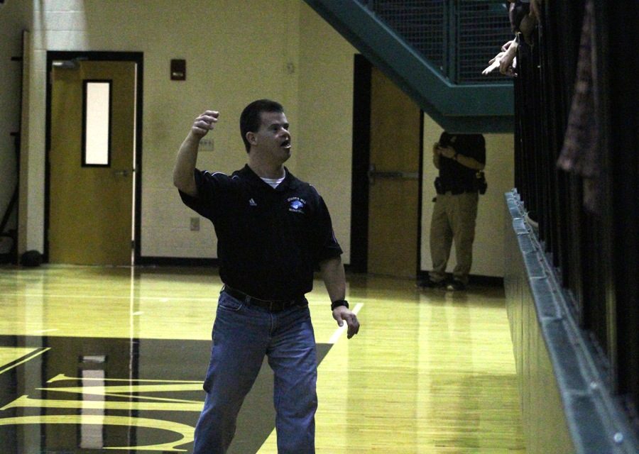Harris fires up the Mill’s student section before their game against McIntosh on Jan 20. He is present at every home and away game to cheer the boys on and be around the sport he loves. “Its all a game, and he enjoys it for basketball. He doesnt get caught up in wins and losses and who does well and who doesnt do well so he keeps our players grounded and me humble and he brings a fresh perspective and attitude,” Hutchins said.