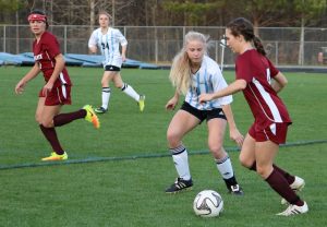A Lady Panther attempts to steal the ball and keep the Vikings away from the box. Girls’ varsity soccer lost 3-0 in a shutout against the Northgate Vikings.