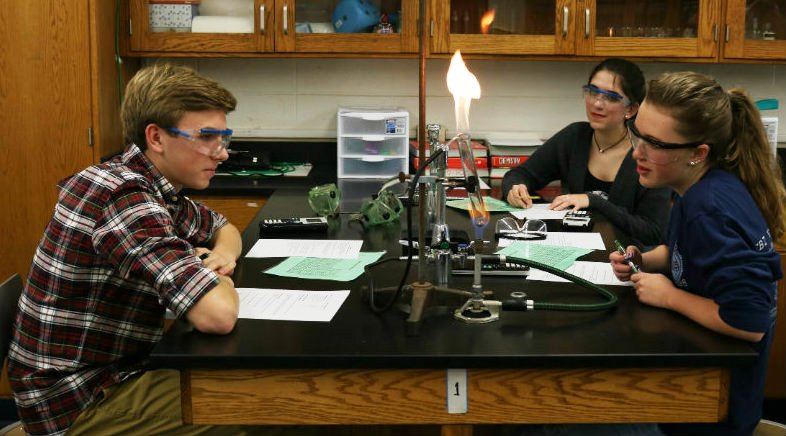 Feb. 3, 2017 - Three sophomores in Michelle Barron’s gifted chemistry class create a flame thrower. The purpose of the lab was to find out what compound caused the flame. 