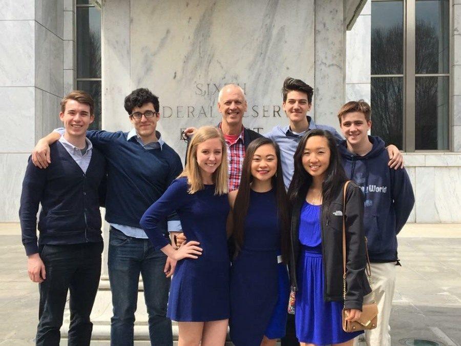 Both economics teams and their sponsor Mark Decourcy stand in front of the Federal Reserve in Atlanta. The Econ Challenge was held there last week. The Starr’s Mill’s teams placed fourth in one division and seventh in another. 