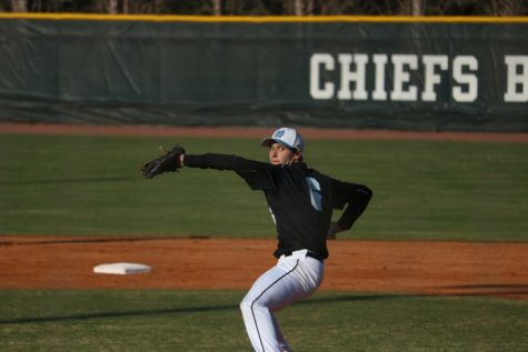 Senior Will Evans throws a pitch off the mound. Evans pitched a complete game shutout against McIntosh, with 10 strikeouts and two hits.