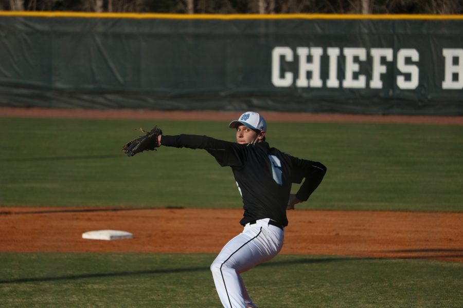 Senior Will Evans throws a pitch off the mound. Evans pitched a complete game shutout against McIntosh, with 10 strikeouts and two hits.