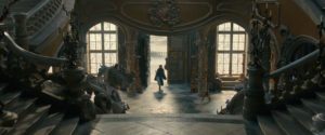 Belle enters the Beast’s castle. The film, while visually striking, struggled with establishing a consistently captivating tone.