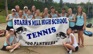 The Starr’s Mill girls tennis team takes a picture with their first place trophy after regions. The Lady Panthers won regions 3-0 allowing them to progress to state. 