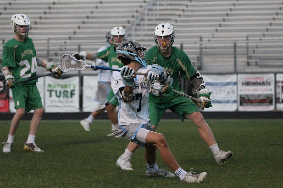 Senior Evan Torres lines up a shot during the match against Buford. Torris led the way for the Panthers, scoring four goals in their 16-11 victory. 