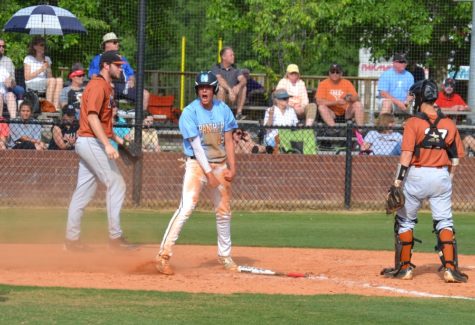  Senior Jake Arnold gets hype after sliding home. The Panthers defeated Kell in round two of the state playoffs 5-2, in both games of the doubleheader Wednesday.