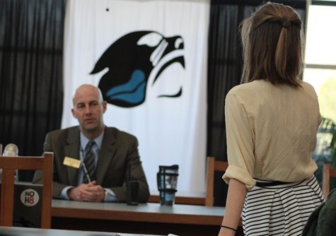 Feb. 11, 2016 - Editor-in-Chief of the Prowler Erin Schilling poses a question to Principal Allen Leonard during a called press conference in the media center. High school journalism programs create opportunities for students to directly voice their concerns to those in power and then report them to the public.
