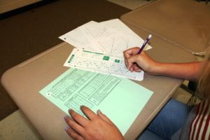 A student is working on a physics assignment. This year the amount of students taking Physics: C has more than doubled from eight to seventeen.