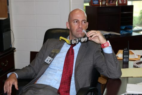 Principal Allen Leonard poses for a photo in his office on the day of the “Great American Eclipse.” “Safety is number one,” Leonard said. “Number two is making sure that [students] have the proper environment... and the time to be able to accomplish what needs to be done.”