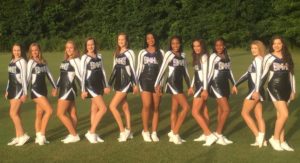 The Pantherettes dance team poses for a picture. By winning the Universal Dance Association dance camp competition, the team qualified for Nationals to be held in February.