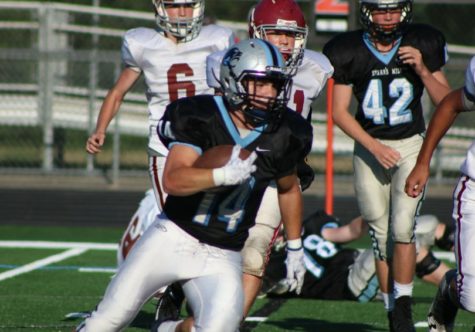 Sophomore running back Ardit Hoti runs the ball. The JV Panthers ran the ball with ease, with running backs scoring all of the team’s touchdowns in the 41-14 win.